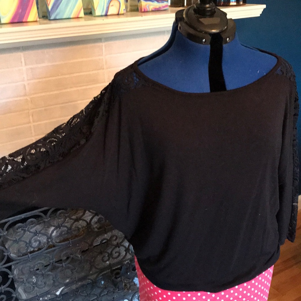 Black three-quarter sleeve shirt with lace inset